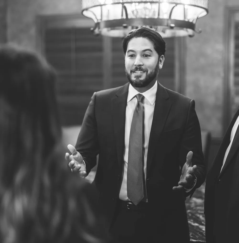 Christopher speaking with clients